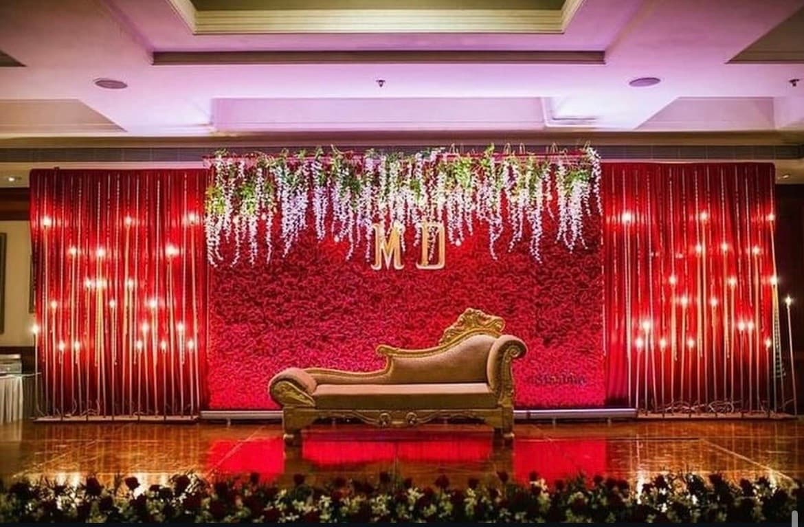 Reception stage, backdrop and photo-corner setups.